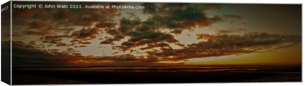 Crosby Beach at sunset Canvas Print by John Wain