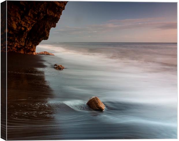 The Rock Face Canvas Print by Kev Alderson