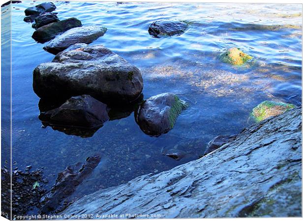 Rocks in Lake Canvas Print by Stephen Conroy