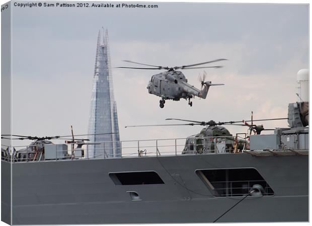 HMS Ocean,the Shard and a helicopter. Canvas Print by Sam Pattison