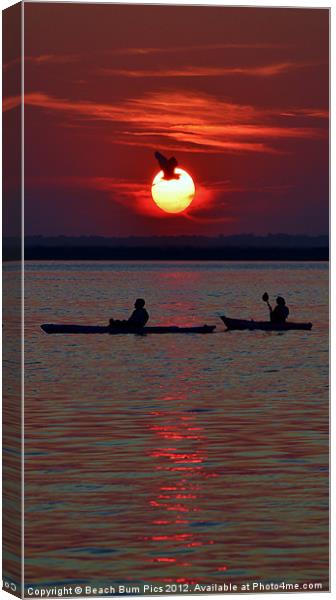 Heron & Kayakers Sunset Canvas Print by Beach Bum Pics