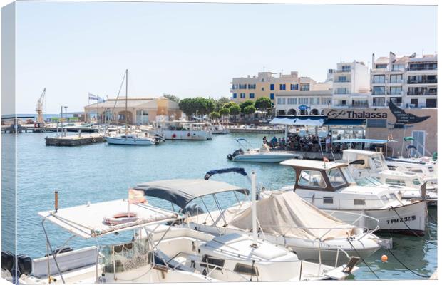 Cala Bona Harbour Canvas Print by Graham Custance