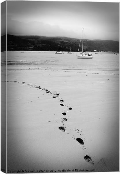 Footsteps in the sand Canvas Print by Graham Custance