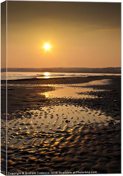 Sunset on the beach Canvas Print by Graham Custance