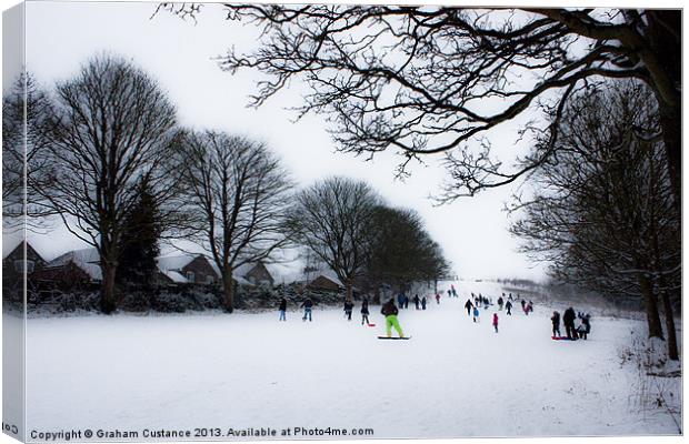 Sledging at the Downs Canvas Print by Graham Custance