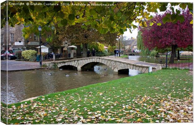Bourton on the Water Canvas Print by Graham Custance