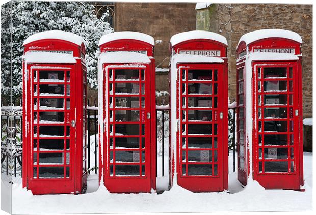 Phone boxes in the snow Canvas Print by Stephen  Hewett