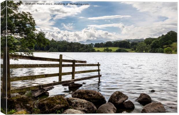 Old fence at Loughrigg Tarn Canvas Print by Graham Moore