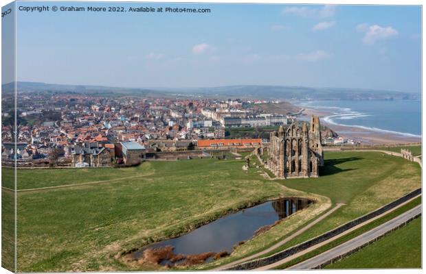 Whitby Abbey and town Canvas Print by Graham Moore