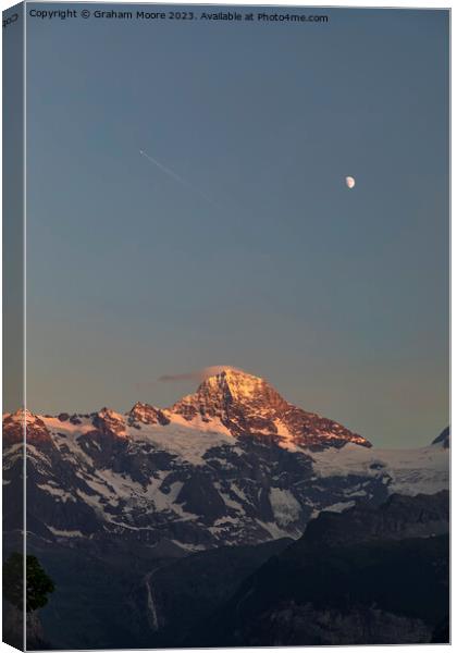Jungfrau and Moon sunset Canvas Print by Graham Moore