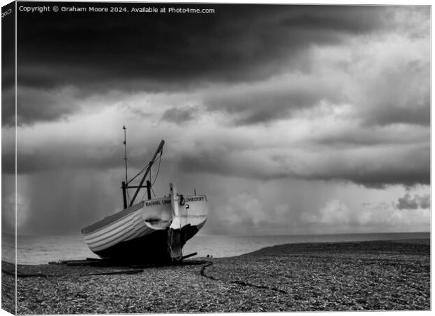 Beached fishing boat Canvas Print by Graham Moore