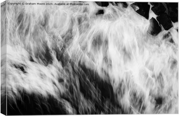 Waves crashing on rocks Canvas Print by Graham Moore