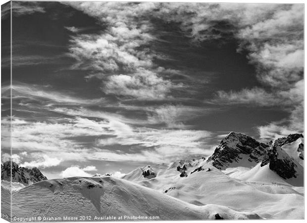 Clouds above Courchevel Canvas Print by Graham Moore