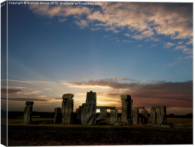 Stonehenge summer solstice sunrise Canvas Print by Graham Moore
