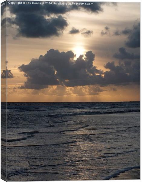 Ray of Sunset Canvas Print by Lou Kennard