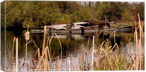 sunken barge Canvas Print by Daniel Duchacek