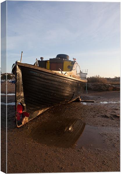 Stranded at Blakeney Canvas Print by Howie Marsh