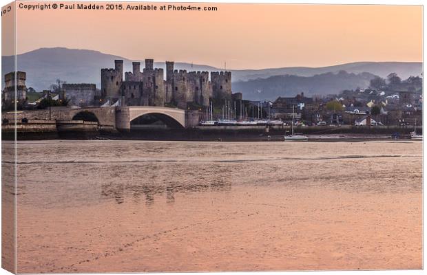 Conwy Castle and harbour at dusk Canvas Print by Paul Madden
