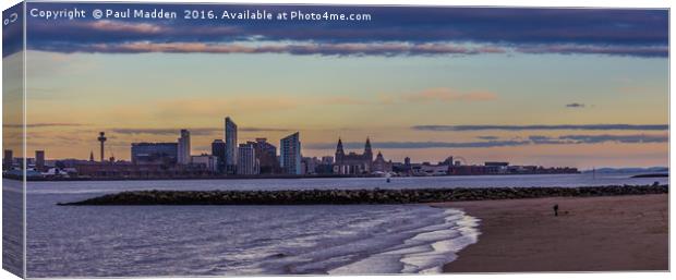 The river to the city Canvas Print by Paul Madden