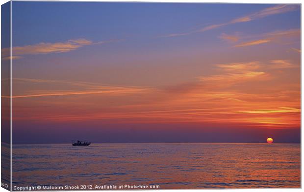 Fishing boat at sunset Canvas Print by Malcolm Snook