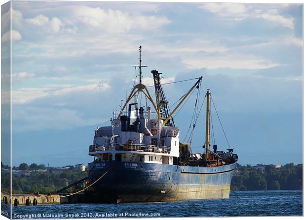 Cargo ship in the islands Canvas Print by Malcolm Snook