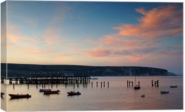 Swanage Pier & Ballard Down at Sunset Canvas Print by Darren Galpin