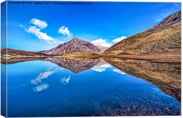  Reflections of Pen Yr Ole Wen in Llyn Idwal, Snow Canvas Print by Pete Lawless