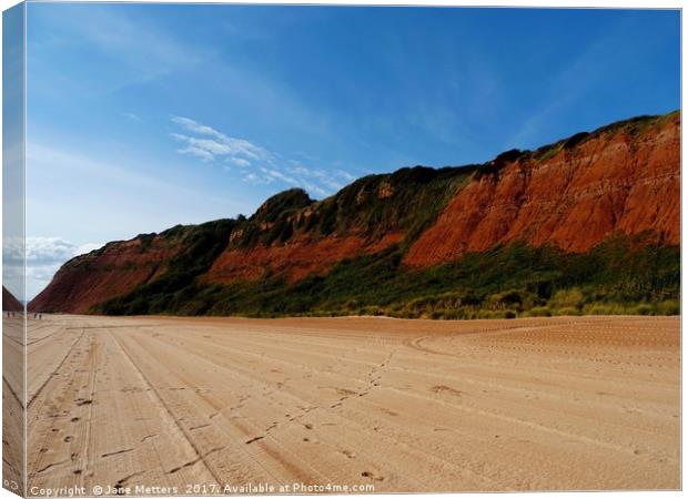    The Red Cliffs of Devon                         Canvas Print by Jane Metters