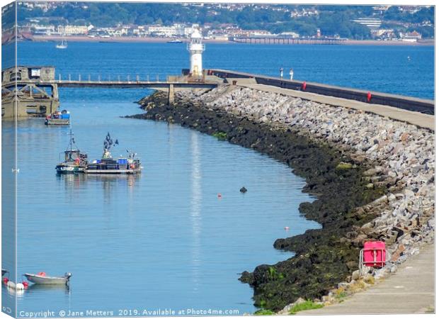 Breakwater and Lighthouse Brixham Canvas Print by Jane Metters