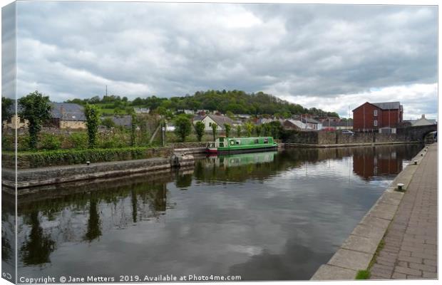 Clouds in the Canal Canvas Print by Jane Metters