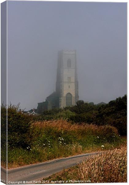 Ghostly Happisburgh church in a sea fret Canvas Print by Avril Harris