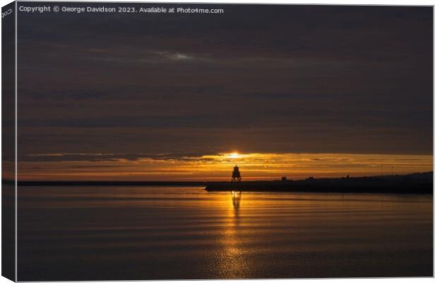 Majestic Sunrise at Herd Groyne Lighthouse Canvas Print by George Davidson