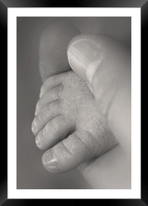 Baby foot in hand Framed Mounted Print by Jonathan Pankhurst