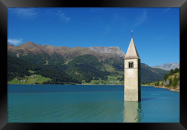 Tower of sunken church in Lago di Resia, Italy Framed Print by Claudio Del Luongo