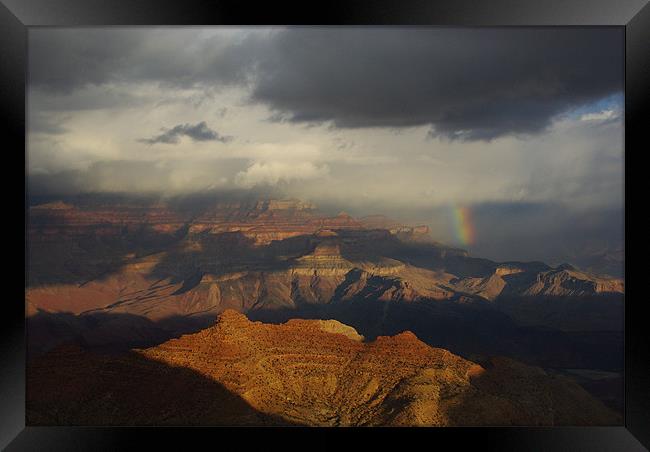 Rainbow, storm cloud and sun on Grand Canyon, Ariz Framed Print by Claudio Del Luongo