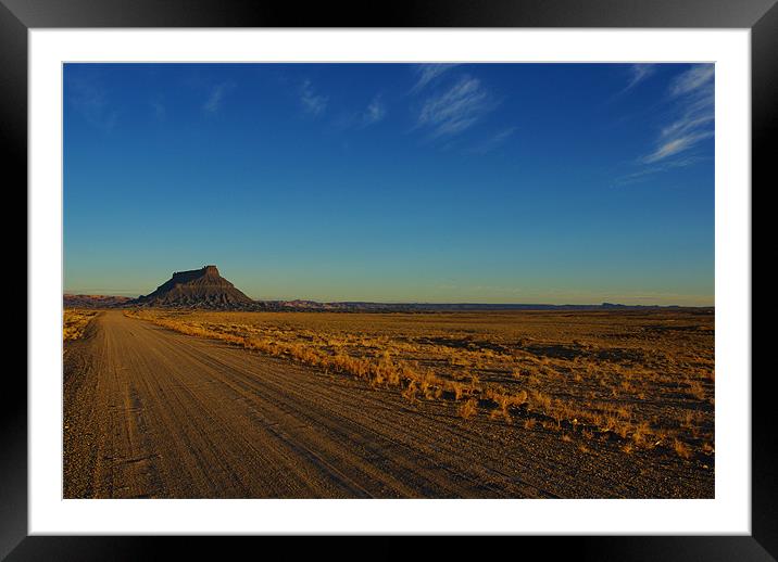 Gravel road to Factory Butte, Utah Framed Mounted Print by Claudio Del Luongo