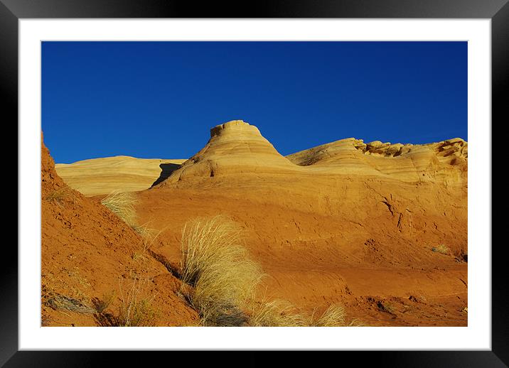 Orange hills and blue sky Framed Mounted Print by Claudio Del Luongo