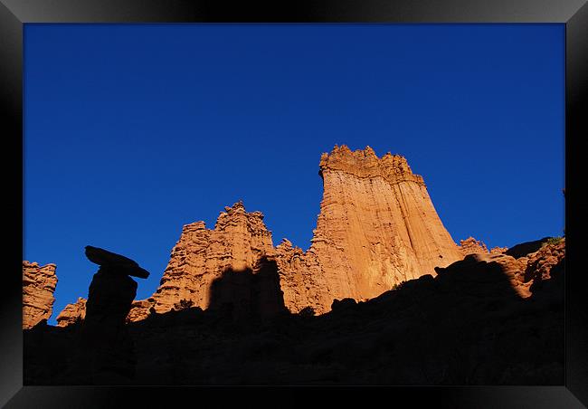 Shadow and light, Fisher Towers, Utah Framed Print by Claudio Del Luongo