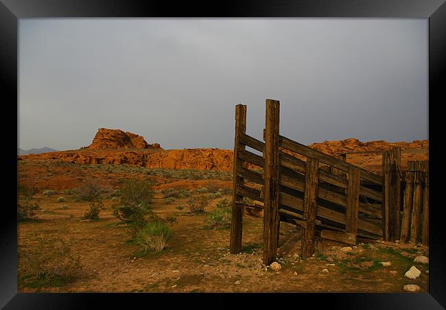Old corral and red rocks Framed Print by Claudio Del Luongo