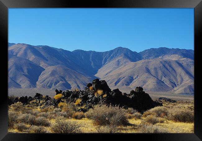 Volcanic rocks and mountains Framed Print by Claudio Del Luongo
