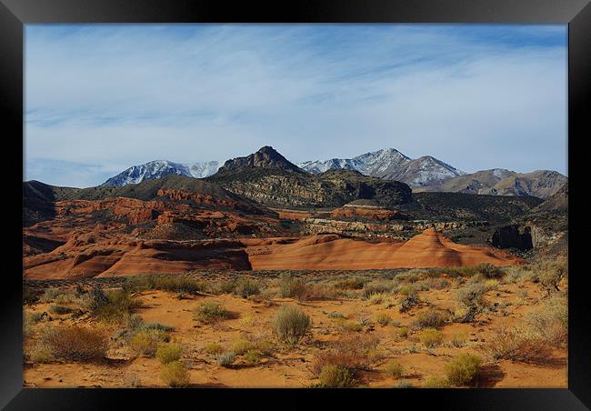 Orange sand, red rocks and Henry Mountains, Utah Framed Print by Claudio Del Luongo