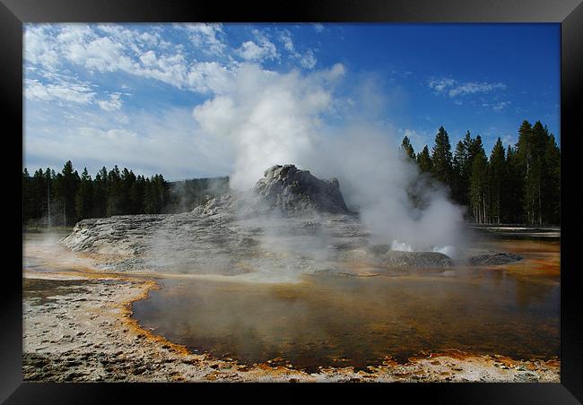 Geyser and hot pool in Yellowstone Framed Print by Claudio Del Luongo