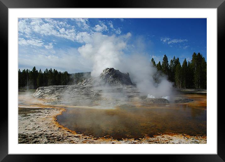 Geyser and hot pool in Yellowstone Framed Mounted Print by Claudio Del Luongo