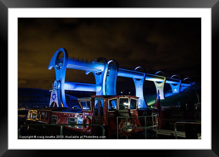 Blue Wheel and the boat Framed Mounted Print by craig beattie