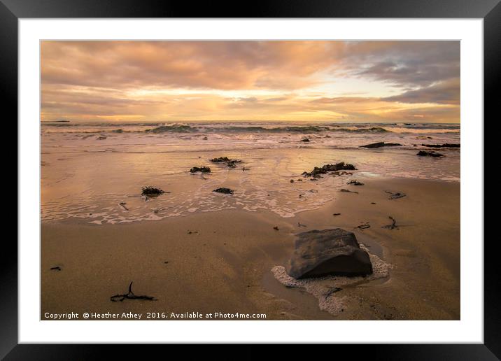 Winter sunset at Seahouses Framed Mounted Print by Heather Athey
