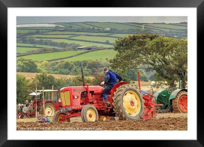 Red Vintage Tractor Plowing, Framed Mounted Print by Dave Bell