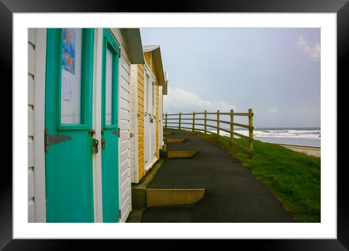 Beach Huts, Colored Chalets Framed Mounted Print by Dave Bell