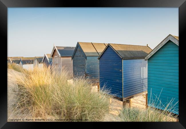 Beach huts at Wells-Next-the-Sea Framed Print by Martin Williams