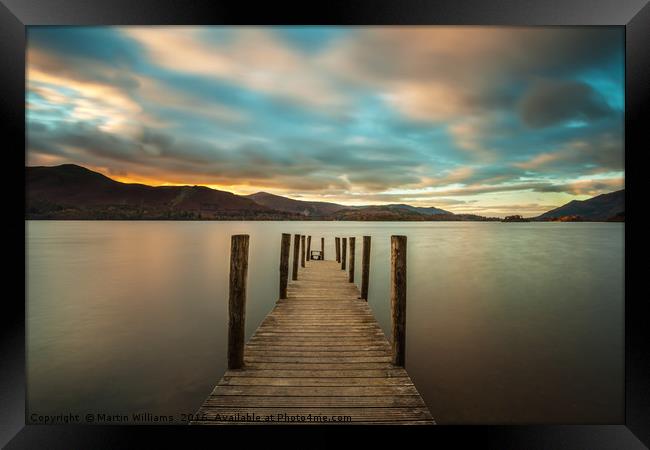 The sun sets over Derwent Water at Ashness Jetty Framed Print by Martin Williams