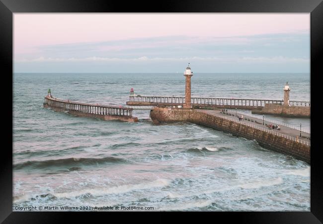 Whitby piers viewed from West Cliff Framed Print by Martin Williams